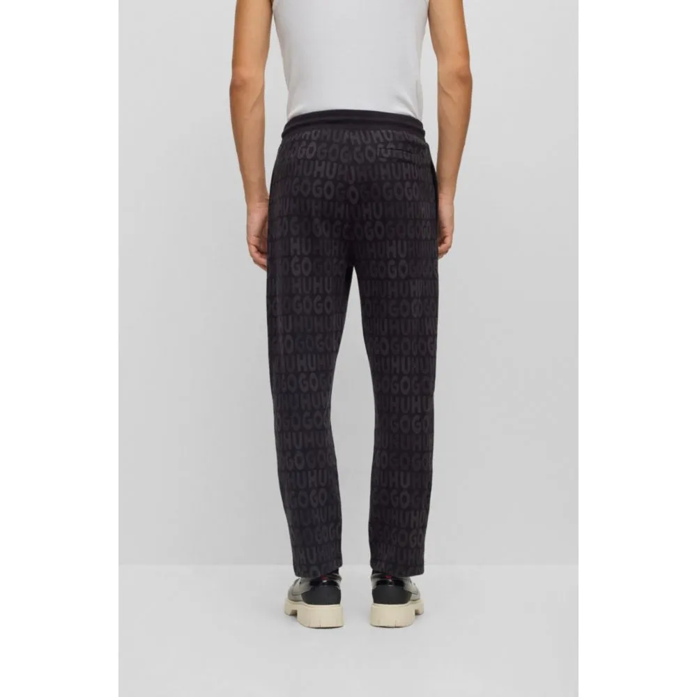 Baumwoll-Jogginghose mit Kordelzug und Monogramm-Jacquard