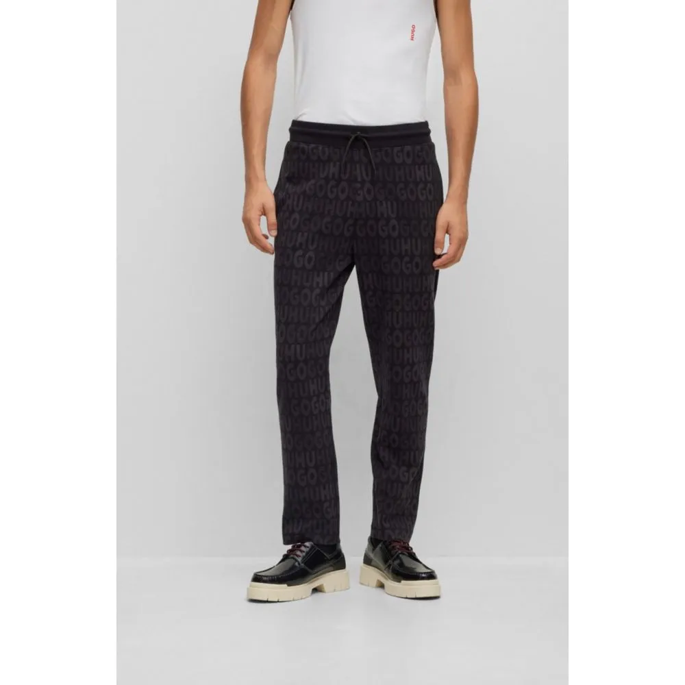 Baumwoll-Jogginghose mit Kordelzug und Monogramm-Jacquard